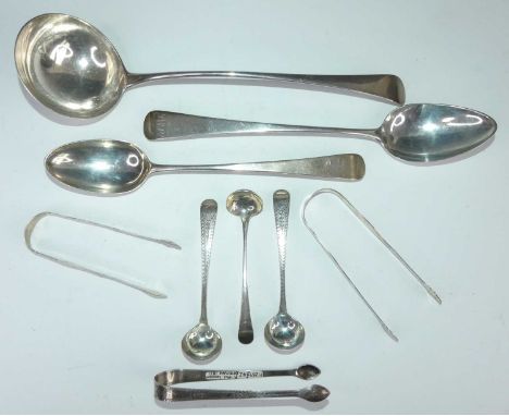 A collection of George III silver flatware by the Bateman family of silversmiths, comprising a basting spoon in the Old Engli