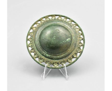 CA. 1200 AD. Interesting, cast bronze military fitting with open-work rim; elaborate floral decoration and remains of enamel 