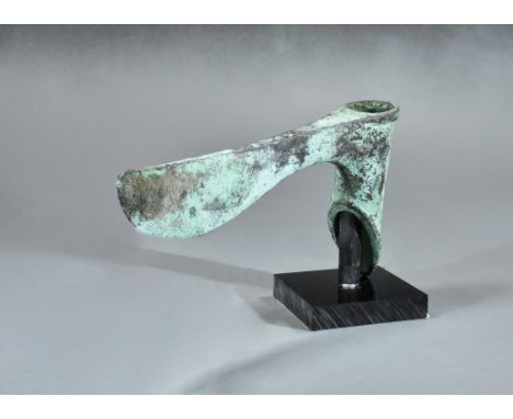 Ca. 2000 BC. Unusual Near Eastern Bronze Age axe head with socket with ribbed upper edge and ribbed chevrons to the rear face