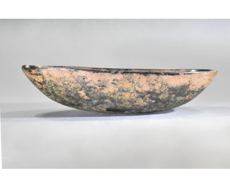 Ca.500 AD. A hand-raised elongated bronze bowl with thickened rim, curved underside shaped like a boat; Good condition, intac