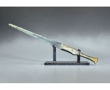 Ca. 800 BC. Bronze Age Near Eastern decorated sword with intact handle. A fine example of a lost wax cast bronze sword with a