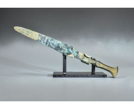 Ca. 800 BC. Bronze Age, Near Eastyern, decorated short sword with intact handle. A fine example of a lost wax cast bronze sho