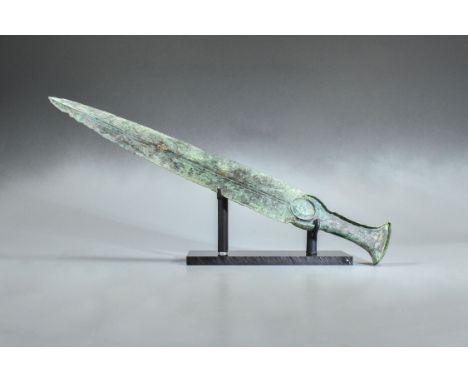 CA.800 BC. Greek Archaic period (bronze Age) bronze short sword with tapering lentoid-section two-edged blade, crescentic low