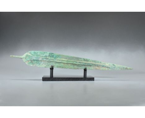 Ca. 800 BC. Greek Archaic period wide sword blade. A large and well-formed bronze blade that rises in the center in a very ge