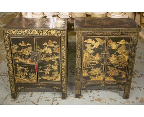 CHINESE SIDE CABINETS, two similar, black lacquer with gilded detail and two doors enclosing a shelf, 36cm D x 59cm W x 82cm 