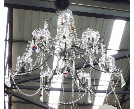 CHANDELIER, six branch in a chromed metal frame, with crystal drops, 58cm H plus chain.