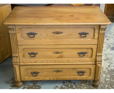 COMMODE, late 19th century German pine with three drawers between fluted pilasters, 81cm H x 103cm W x 55cm D.