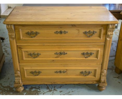 COMMODE, late 19th century German pine with three drawers flanked by corbels, 84cm H x 104cm W x 51cm D.