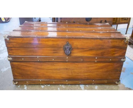 TRUNK, late 19th century/early 20th century wood and brass bound with ash struts, brass studs rising lid, carrying handles, a