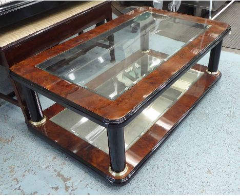 OCCASIONAL TABLE, with glass top and undershelf in burr walnut on pillar supports.