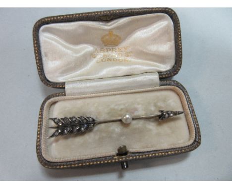A diamond and pearl arrow brooch cased by Asprey, the arrow head and flight feathers set throughout with rose cut diamonds, o