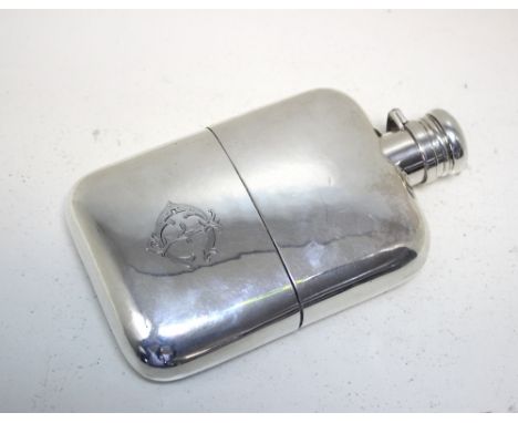 A Victorian silver hip flask, by Sampson Mordan & Co, London 1892, of rectangular outline and curved section with bayonet cap