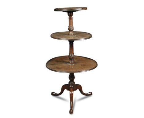 A George III mahogany dumb waiter, with revolving tiers, wrythen moulded columns on a tripod base 110 x 59cm (43 x 23in)  Old