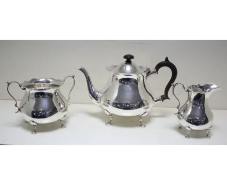 An Edwardian silver three piece tea set, by The Goldsmiths' and Silversmiths' Company, London 1909, comprising a teapot with 