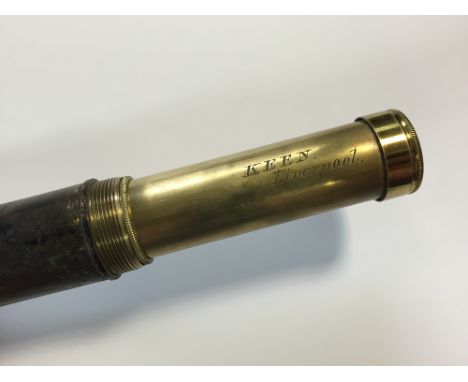 A Victorian combination walking stick and telescope, the single drawer eyepiece tube marked 'Keen Liverpool', the patinated c