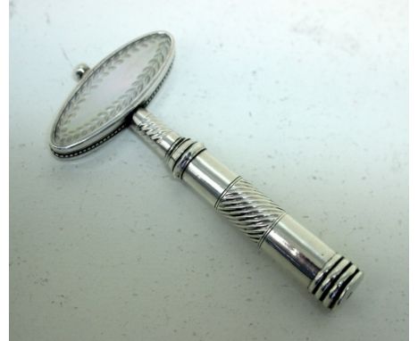 A late 18th century silver pocket corkscrew, by Samuel Pemberton (maker's mark only), the oval handle inset with mother of pe