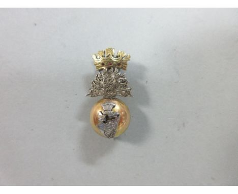 A gemset regimental brooch for the Royal Irish Fusiliers, in unmarked bi-colour precious metal, the harp edge and all the fla