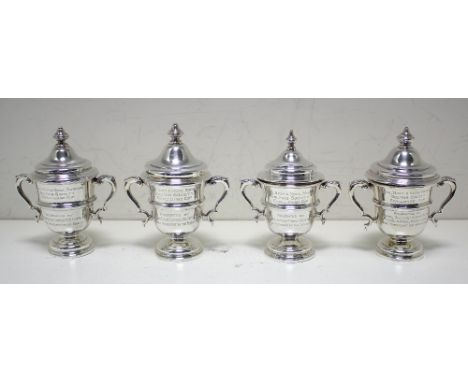 Royal Navy & Royal Marines Golfing Society Challenge Cup - four miniature silver trophy cups and covers, all by The Goldsmith