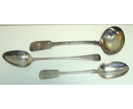 A Victorian silver fiddle pattern gravy spoon, by Aldwinckle and Slater, London 1884, initialled B, 29cm; A George III silver