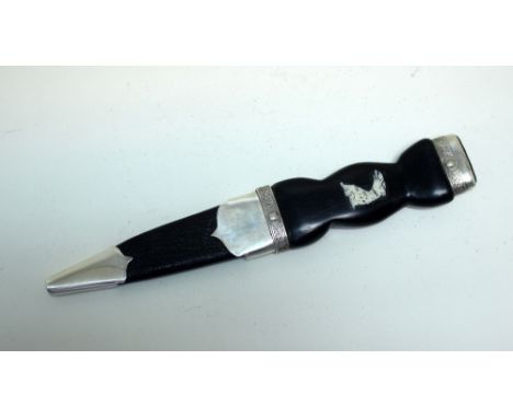 A silver mounted Sgian-dubh, by F Graham, Edinburgh 1992, the shaped ebonised handle with silver celtic patterned mount with 