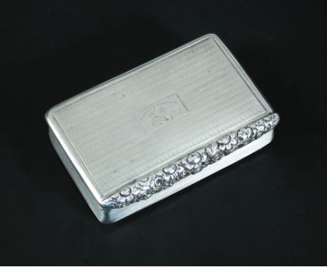 A George IV silver snuffbox, by Joseph Willmore, Birmingham 1825, rectangular, engine turned with reeded sides, floral and fo