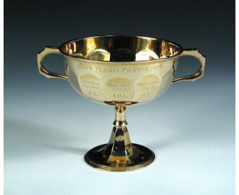 Lawn Tennis France 1929' - a 9ct gold trophy cup, by The Adie Brothers, Birmingham 1929, the panelled dodecagonal bowl with t