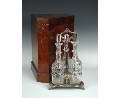 A Victorian mahogany decanter case, the triform box with hinged cover, opening to reveal an electroplate three bottle stand a