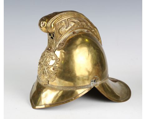 A late 19th/early 20th century brass Merryweather-type fireman's helmet with dragon-decorated comb cresting, applied badge wi