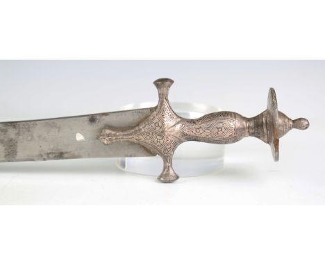 A 19th century Indian tulwar with curved watered blade, blade length 84cm, damascened steel hilt, decorated with linear and f