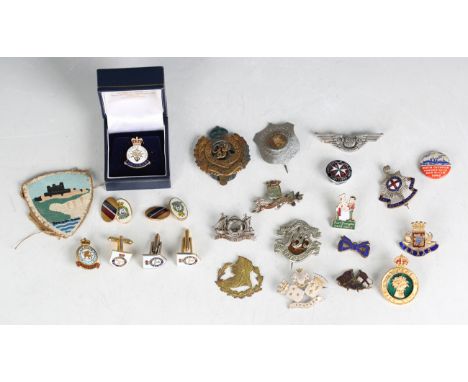 A small collection of badges, including RAF interest, a Royal Sussex Regiment enamelled sweetheart brooch, Women's Land Army,