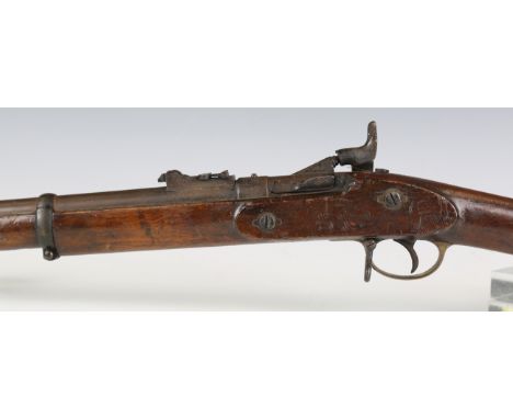 A Snider-Enfield .577 three-band military rifle, barrel length 93cm, the lockplate detailed with crown and 'Tower 1869', with