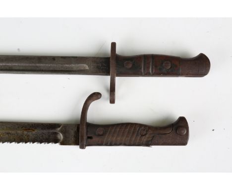 A First World War period Mauser saw-back bayonet, blade length 36cm, marked 'Waffenfabrik Mauser A.G. Oberndorf a.N.' (overal