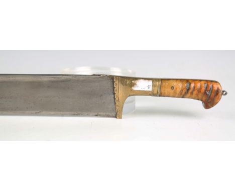 A 19th century Khyber sword with typical T-shaped blade, blade length 58.5cm, brass fitted hilt, decorated with ring and dot 