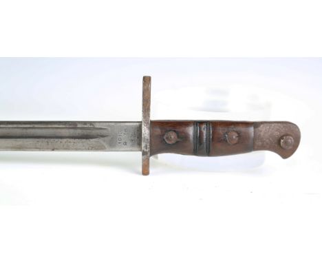 A group of three bayonets, comprising a British 1913 Remington bayonet, blade length 43cm, with leather scabbard and frog, a 