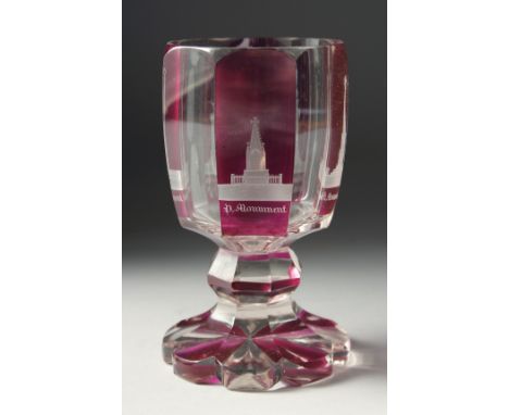 A GOOD BOHEMIAN TWO COLOURED GLASS GOBLET engraved with a panel of monuments. 5.25ins high.