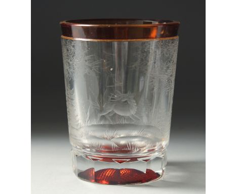 A GOOD BOHEMIAN TWO COLOURED GLASS BEAKER engraved with a man hunting deer. 5ins high.