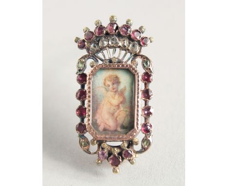 A GOLD VINTAGE PORTRAIT BROOCH "YOUNG LADY" with diamonds and rubies.