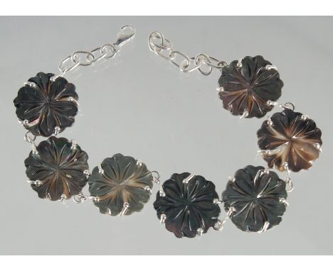 A SILVER AND MOTHER OF PEARL BRACELET.