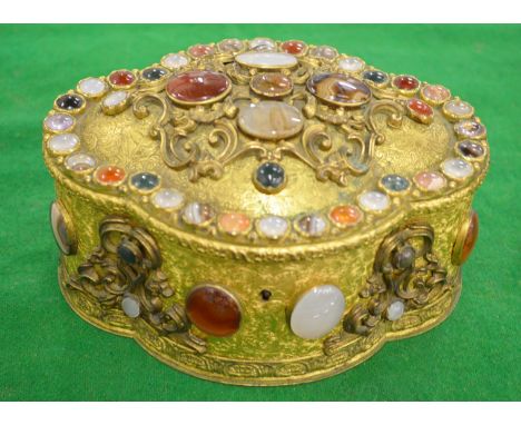 A GOOD CONTINENTAL GILT METAL JEWELL CASKET set with numerous agate, jade and other stones.