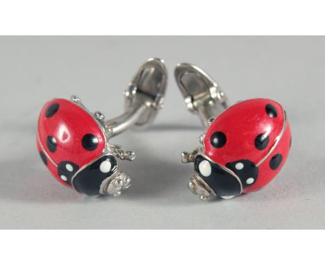 A PAIR OF SILVER AND ENAMEL LADYBIRD CUFFLINKS.