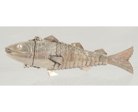 A CHINESE FLEXIBLE SILVER FISH. 4ins long.
