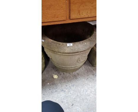 A large circular planter 