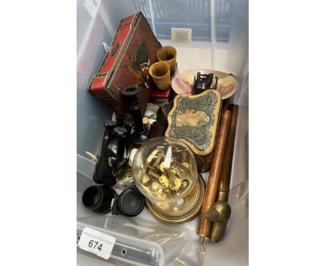 A box of collectables including vintage tins, horn drinking cups, ebony pot, glass domed clock, 3 part walking stick, elephan