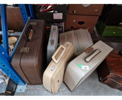 4 portable typewriters and an office typewriter. 