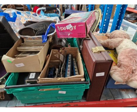 A box containing Hornby Dublo carriages, postcards, crown green bowls, bag of clogs, 2 Bayko building sets, a teddy bear, jig
