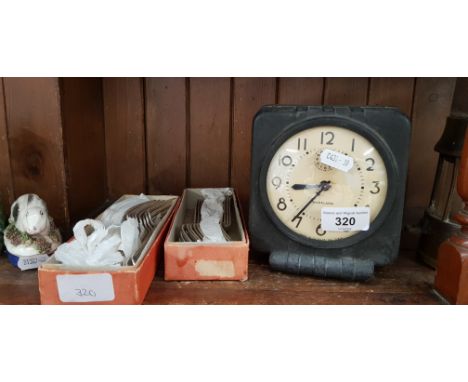 A WWII era American Waralarm War alarm clock made in 1944 by Western Clock Co, La Salle, Illinois, USA, 1944, together with t