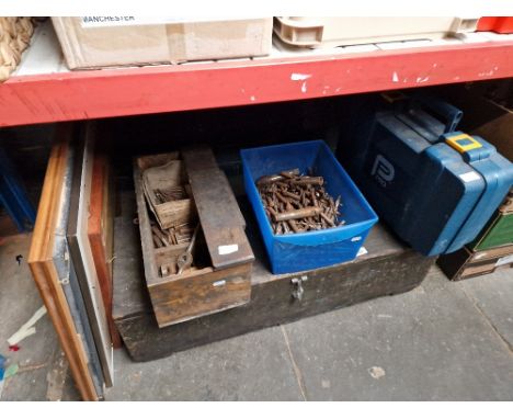 Assorted tools comprising a wooden toolbox, Record bolt cutters, chisels, tap and die set, drill bits, orbital sander, etc. 