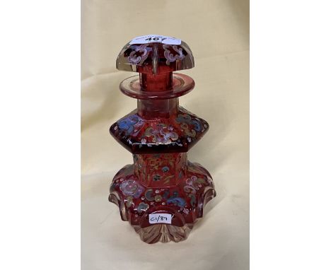 A painted Bohemian ruby glass scent bottleCondition:- General wear to guilding & flowers, very small nibbles to bottom edge o