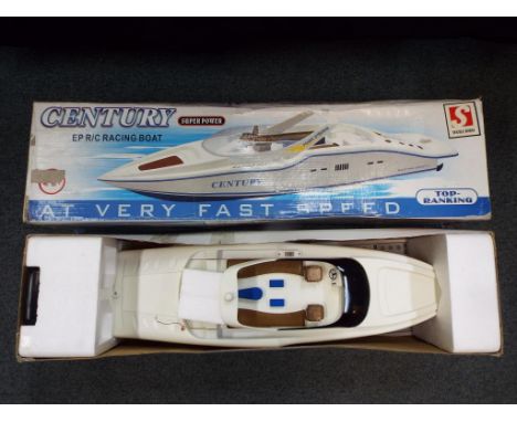 R/C boat - CENTURY  EP/C racing boat in original box with unused decals and instructions Est £20 - £40.