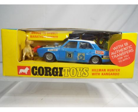 Corgi - #302 Hillman Hunter with kangaroo, model appears to be in mint condition in e to nm box. Estimate £60 - £80